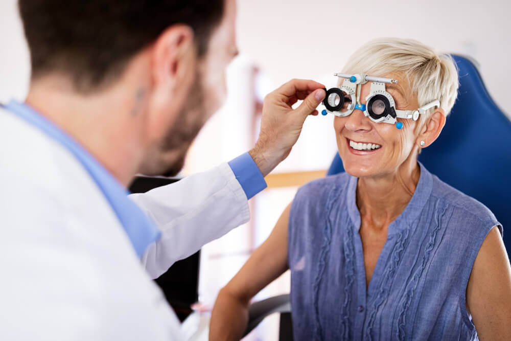 Eye doctor reviewing retinal images for signs of disease
