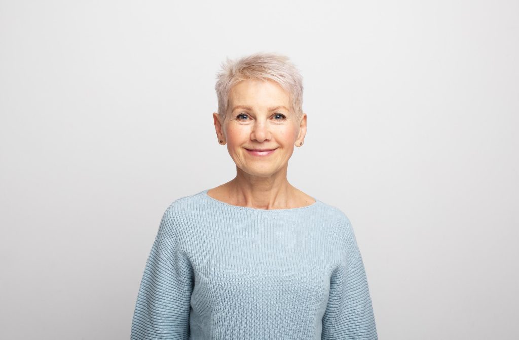 Smiling older woman with refreshed, youthful eyes